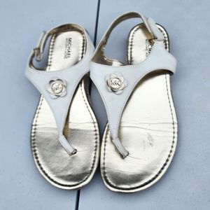 Michael Kors girls 4 gold and white Stefanya sandals used good condition